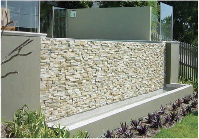 Garden feature wall in light stacked stone
