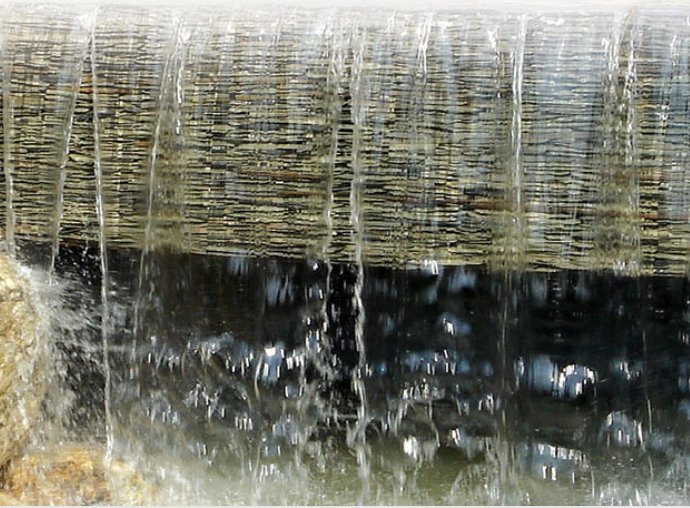 Water feature over natural stone
